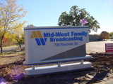 New Mid-West Family sign